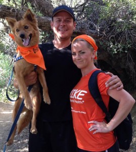 Two- and four-footed hikers wearing their orange on the hike